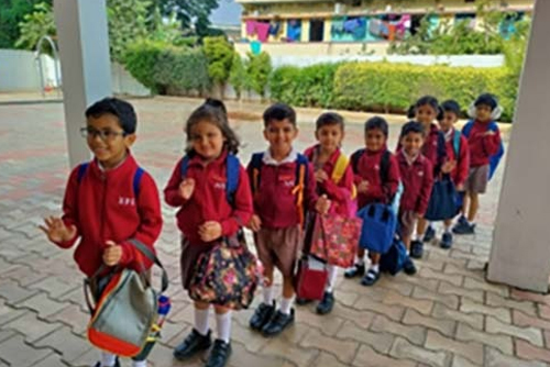 Children arriving at kindergarten